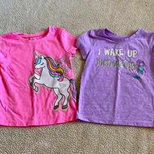2 colorful girls shirts